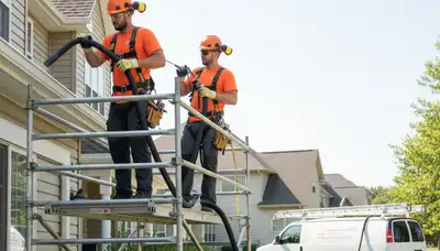Orlando, FL siding contractor preparing exterior home for gutter cleaning and storm protection
